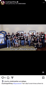 The pictures shows smiling people holding up the trophies that they won at SuperRigs posing for a group photo.